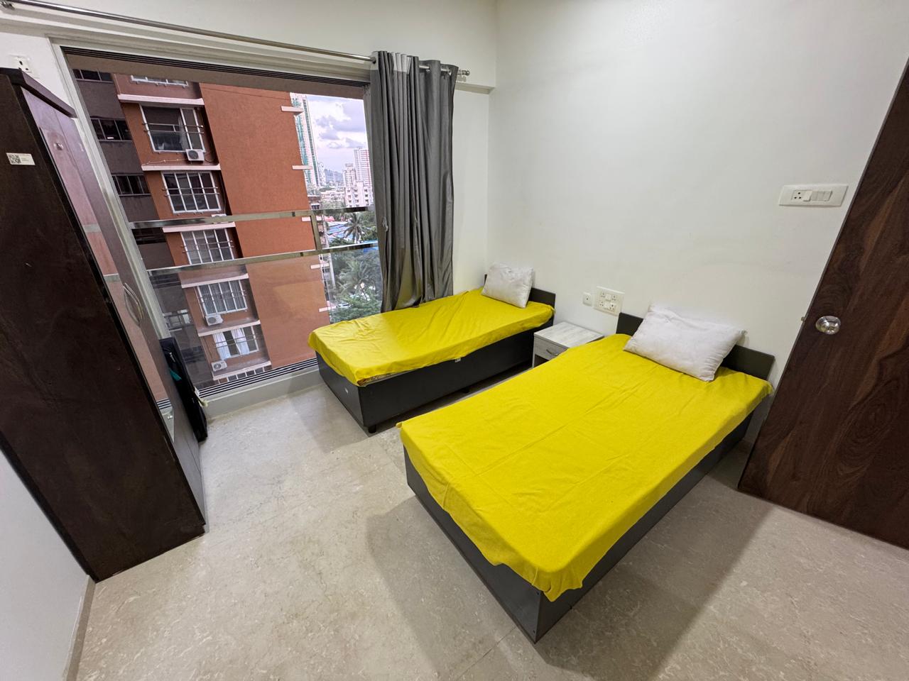 Two-sharing bedroom in PG in Goregaon West, Mumbai