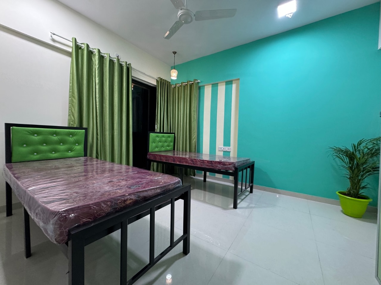 Two Sharing Bedroom With Attached Bath